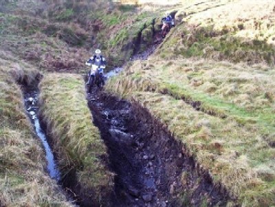 Motor cyclists on lane, Peak District, Derbyshire